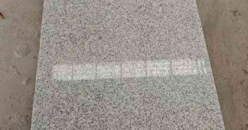 拉萨芝麻白光面毛板